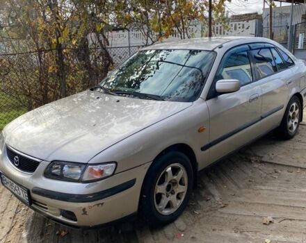 Серый Мазда 626, объемом двигателя 2 л и пробегом 312 тыс. км за 3399 $, фото 1 на Automoto.ua