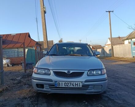 Серый Мазда 626, объемом двигателя 2 л и пробегом 300 тыс. км за 1200 $, фото 1 на Automoto.ua