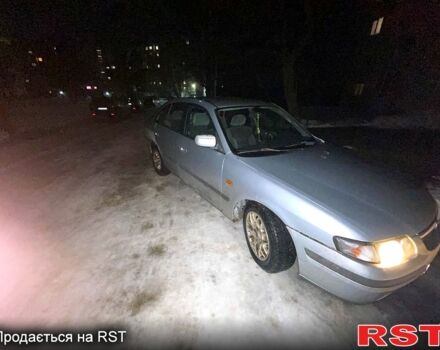 Серый Мазда 626, объемом двигателя 2 л и пробегом 250 тыс. км за 2000 $, фото 1 на Automoto.ua