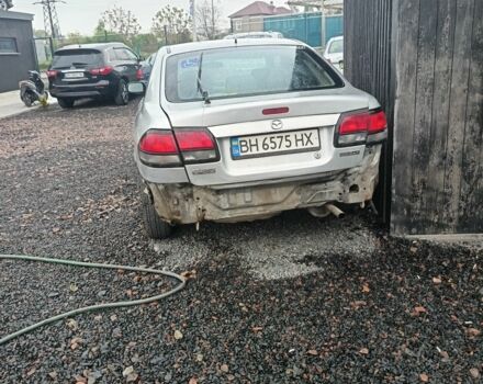 Серый Мазда 626, объемом двигателя 2 л и пробегом 234 тыс. км за 640 $, фото 1 на Automoto.ua
