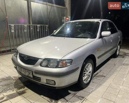 Серый Мазда 626, объемом двигателя 2 л и пробегом 105 тыс. км за 3800 $, фото 1 на Automoto.ua