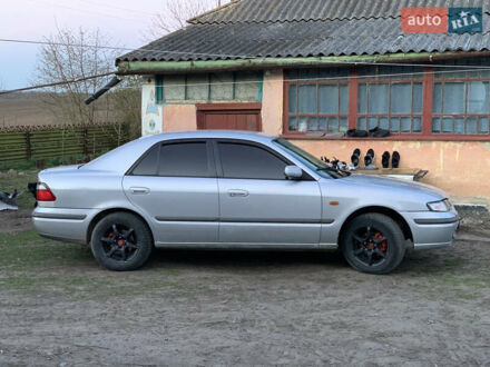 Сірий Мазда 626, об'ємом двигуна 2 л та пробігом 328 тис. км за 2000 $, фото 1 на Automoto.ua