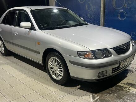 Серый Мазда 626, объемом двигателя 2 л и пробегом 105 тыс. км за 3800 $, фото 1 на Automoto.ua