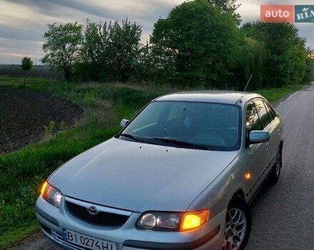 Серый Мазда 626, объемом двигателя 2 л и пробегом 380 тыс. км за 1800 $, фото 1 на Automoto.ua