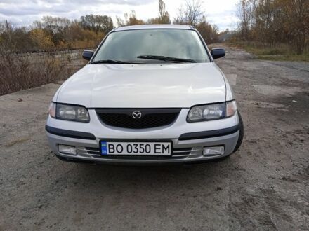 Серый Мазда 626, объемом двигателя 2 л и пробегом 333 тыс. км за 2500 $, фото 1 на Automoto.ua