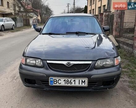 Серый Мазда 626, объемом двигателя 2 л и пробегом 243 тыс. км за 2560 $, фото 1 на Automoto.ua
