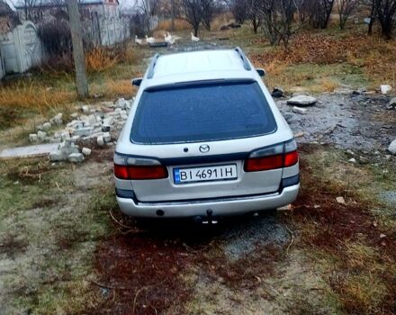 Серый Мазда 626, объемом двигателя 1.8 л и пробегом 400 тыс. км за 2500 $, фото 1 на Automoto.ua