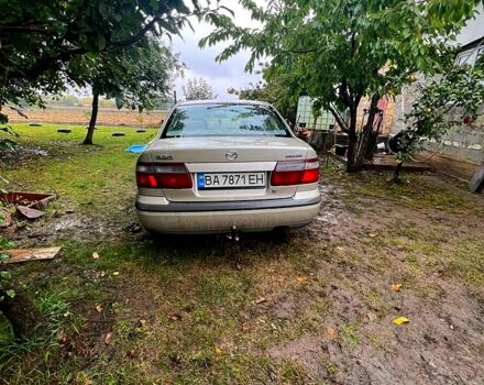 Серый Мазда 626, объемом двигателя 2 л и пробегом 470 тыс. км за 1500 $, фото 1 на Automoto.ua