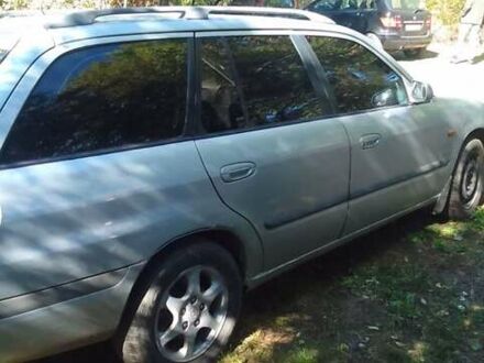 Серый Мазда 626, объемом двигателя 2 л и пробегом 250 тыс. км за 1800 $, фото 1 на Automoto.ua