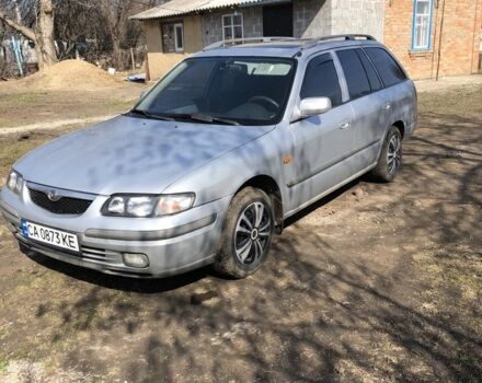 Серый Мазда 626, объемом двигателя 1.8 л и пробегом 250 тыс. км за 3000 $, фото 1 на Automoto.ua