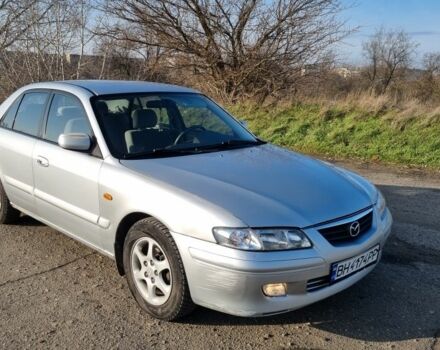 Серый Мазда 626, объемом двигателя 2 л и пробегом 230 тыс. км за 3600 $, фото 1 на Automoto.ua