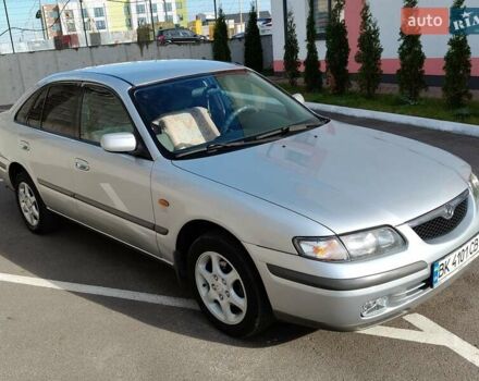 Серый Мазда 626, объемом двигателя 2 л и пробегом 256 тыс. км за 3550 $, фото 1 на Automoto.ua