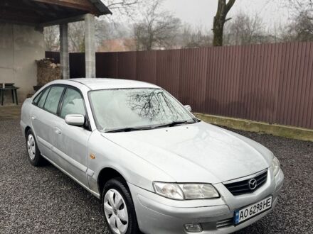 Сірий Мазда 626, об'ємом двигуна 2 л та пробігом 220 тис. км за 1700 $, фото 1 на Automoto.ua