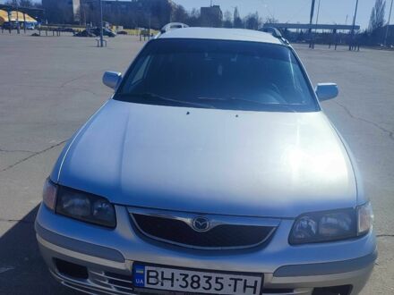 Серый Мазда 626, объемом двигателя 2 л и пробегом 428 тыс. км за 2750 $, фото 1 на Automoto.ua