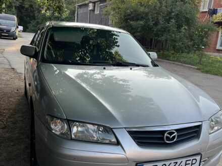 Серый Мазда 626, объемом двигателя 2 л и пробегом 386 тыс. км за 2950 $, фото 1 на Automoto.ua