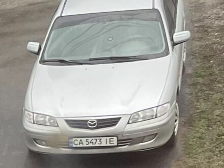 Серый Мазда 626, объемом двигателя 2 л и пробегом 382 тыс. км за 2950 $, фото 1 на Automoto.ua