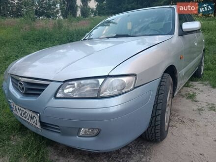 Серый Мазда 626, объемом двигателя 2 л и пробегом 344 тыс. км за 1650 $, фото 1 на Automoto.ua