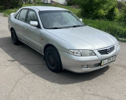 Серый Мазда 626, объемом двигателя 2 л и пробегом 310 тыс. км за 2600 $, фото 1 на Automoto.ua