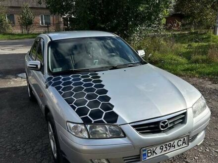 Серый Мазда 626, объемом двигателя 2 л и пробегом 295 тыс. км за 2500 $, фото 1 на Automoto.ua