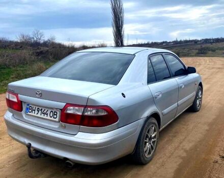Серый Мазда 626, объемом двигателя 2 л и пробегом 301 тыс. км за 2750 $, фото 1 на Automoto.ua