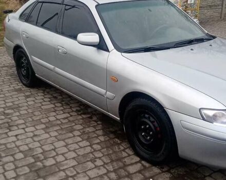 Серый Мазда 626, объемом двигателя 2 л и пробегом 410 тыс. км за 2700 $, фото 1 на Automoto.ua