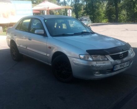 Серый Мазда 626, объемом двигателя 2 л и пробегом 300 тыс. км за 1566 $, фото 1 на Automoto.ua