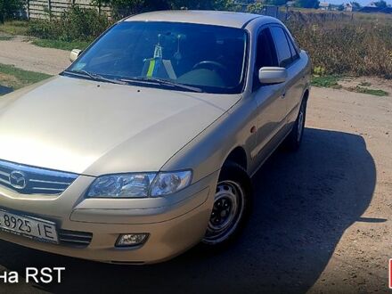 Сірий Мазда 626, об'ємом двигуна 2 л та пробігом 201 тис. км за 3200 $, фото 1 на Automoto.ua