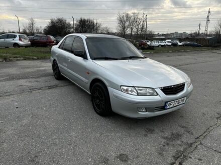 Серый Мазда 626, объемом двигателя 2 л и пробегом 300 тыс. км за 1500 $, фото 1 на Automoto.ua