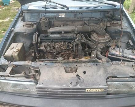 Синий Мазда 626, объемом двигателя 2 л и пробегом 295 тыс. км за 850 $, фото 16 на Automoto.ua
