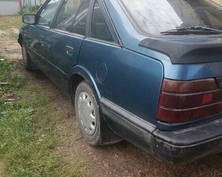 Синий Мазда 626, объемом двигателя 2 л и пробегом 295 тыс. км за 850 $, фото 7 на Automoto.ua