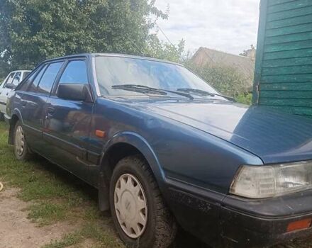 Синий Мазда 626, объемом двигателя 2 л и пробегом 295 тыс. км за 850 $, фото 9 на Automoto.ua