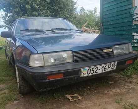 Синий Мазда 626, объемом двигателя 2 л и пробегом 295 тыс. км за 850 $, фото 5 на Automoto.ua