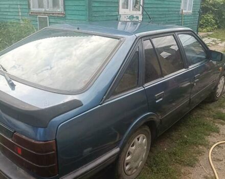 Синий Мазда 626, объемом двигателя 2 л и пробегом 295 тыс. км за 850 $, фото 2 на Automoto.ua