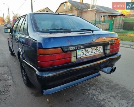 Синій Мазда 626, об'ємом двигуна 2 л та пробігом 300 тис. км за 750 $, фото 4 на Automoto.ua