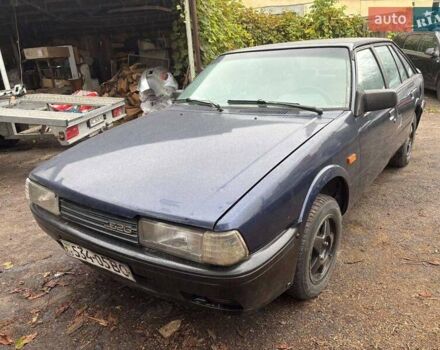 Синий Мазда 626, объемом двигателя 2 л и пробегом 400 тыс. км за 700 $, фото 2 на Automoto.ua