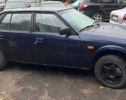 Синий Мазда 626, объемом двигателя 2 л и пробегом 400 тыс. км за 700 $, фото 3 на Automoto.ua