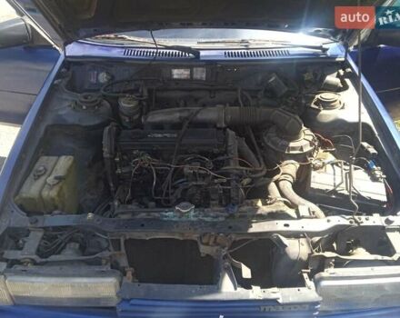 Синій Мазда 626, об'ємом двигуна 1.8 л та пробігом 354 тис. км за 1000 $, фото 3 на Automoto.ua