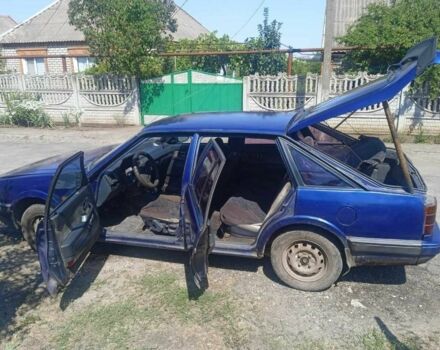 Синий Мазда 626, объемом двигателя 1.8 л и пробегом 354 тыс. км за 1000 $, фото 2 на Automoto.ua