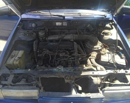 Синий Мазда 626, объемом двигателя 1.8 л и пробегом 354 тыс. км за 1000 $, фото 4 на Automoto.ua