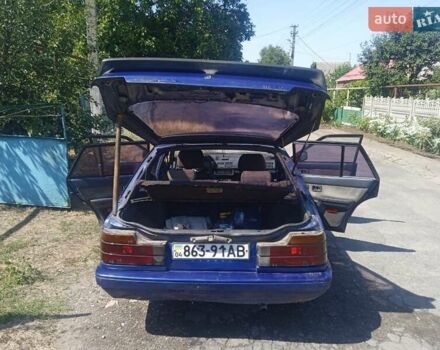 Синій Мазда 626, об'ємом двигуна 1.8 л та пробігом 354 тис. км за 1000 $, фото 1 на Automoto.ua