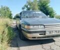 Синий Мазда 626, объемом двигателя 2 л и пробегом 300 тыс. км за 650 $, фото 1 на Automoto.ua