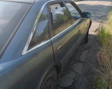 Синий Мазда 626, объемом двигателя 2 л и пробегом 300 тыс. км за 650 $, фото 5 на Automoto.ua