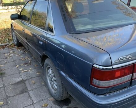 Синий Мазда 626, объемом двигателя 2 л и пробегом 250 тыс. км за 800 $, фото 1 на Automoto.ua