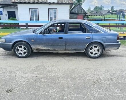 Синий Мазда 626, объемом двигателя 2 л и пробегом 400 тыс. км за 850 $, фото 15 на Automoto.ua