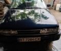 Синій Мазда 626, об'ємом двигуна 2 л та пробігом 357 тис. км за 700 $, фото 1 на Automoto.ua