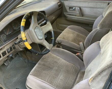 Синий Мазда 626, объемом двигателя 2 л и пробегом 250 тыс. км за 800 $, фото 2 на Automoto.ua