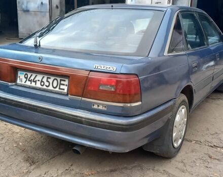 Синий Мазда 626, объемом двигателя 2 л и пробегом 300 тыс. км за 985 $, фото 2 на Automoto.ua