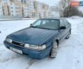 Синий Мазда 626, объемом двигателя 2 л и пробегом 245 тыс. км за 1750 $, фото 1 на Automoto.ua