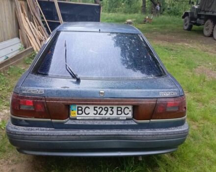 Синий Мазда 626, объемом двигателя 2 л и пробегом 400 тыс. км за 850 $, фото 3 на Automoto.ua