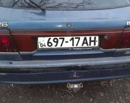 Синий Мазда 626, объемом двигателя 2.2 л и пробегом 350 тыс. км за 750 $, фото 2 на Automoto.ua